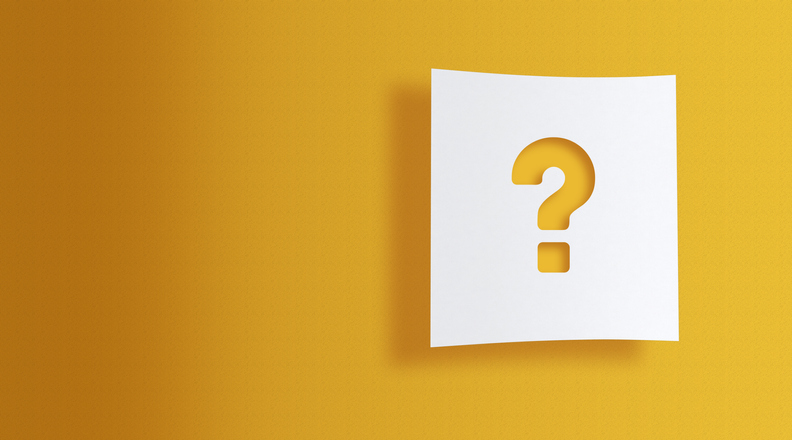 question mark on white information paper on yellow background